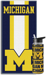 Licensed NCAA Collegiate Fan Bundle Includes Water Bottle and Beach Towel (Michigan Wolverines Striped)